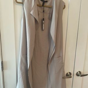 Bcbgmaxazria brand new with tags size medium. Over coat